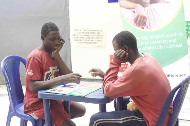Group enjoying ludo game for social interaction and fun